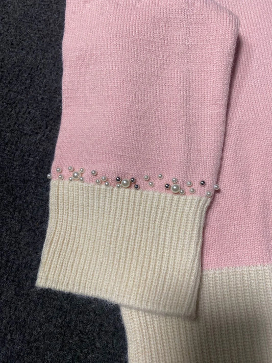 Pastel baby pink women’s knitted sweater